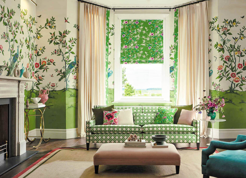 lifestyle photo of green chinoiserie living room featuring diane hill's fabrics and wallpaper