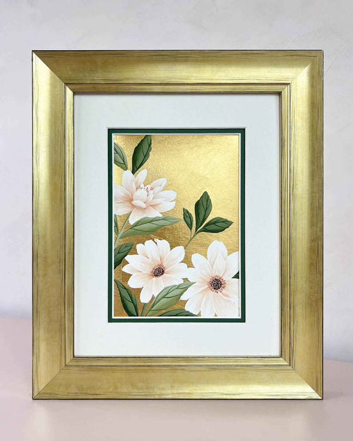 framed botanical chinoiserie painting on gold leaf paper featuring a three pink and white flowers