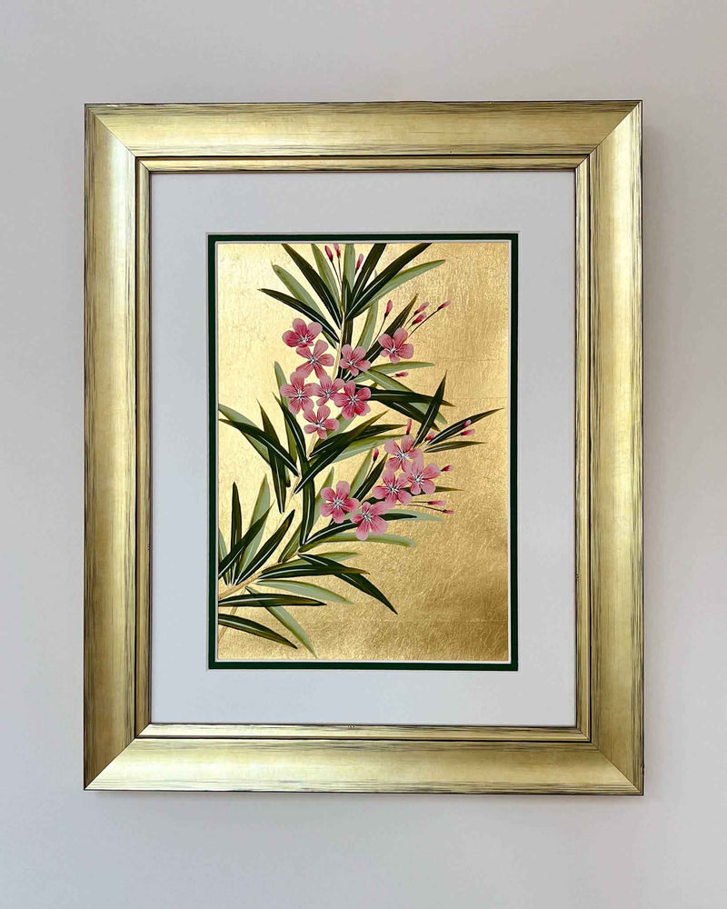 framed floral chinoiserie painting on gold leaf paper featuring pink flowers and green leaves 