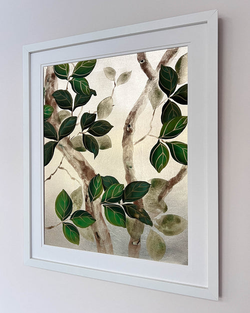 framed botanical chinoiserie painting on metal leaf paper featuring green vines and branches