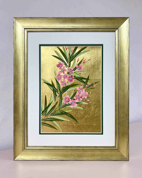 framed floral chinoiserie painting on gold leaf paper featuring pink flowers and green leaves