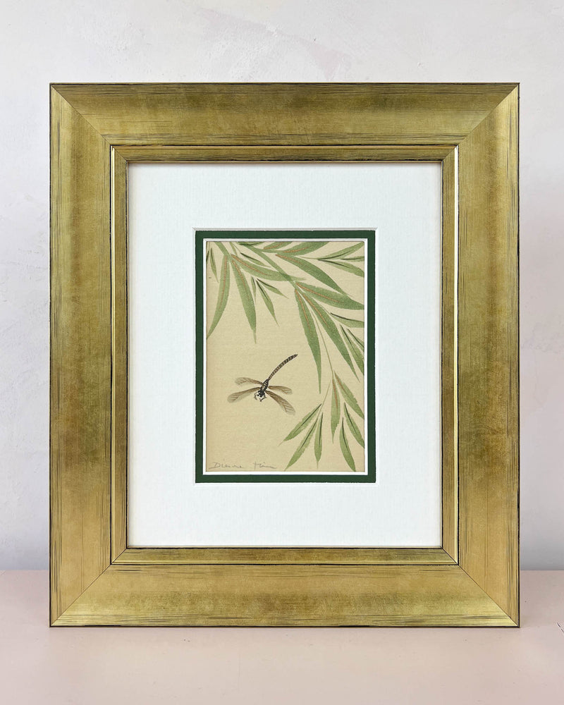 Diane Hill's original chinoiserie painting 'Dragonfly And Foliage (B)' in a gold frame on a plain white background