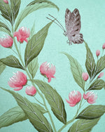 close up of blue chinoiserie painting on silk paper featuring vintage style butterfly, leaves and flowers