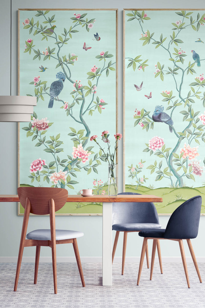 pair of 2 framed blue and green botanical chinoiserie wall panel prints with flowers and birds in Chinese painting style on wall