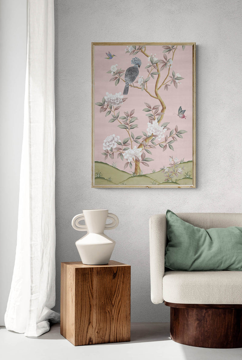 Pink botanical chinoiserie wall art print with flowers and birds in Chinese painting style on wall