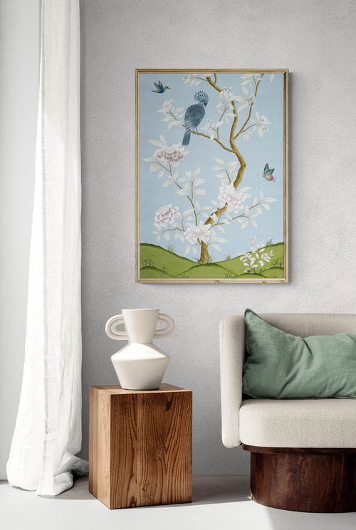 Blue botanical chinoiserie wall art print with flowers and birds in Chinese painting style on wall