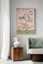 framed pink and green botanical chinoiserie wall art print with flowers and birds in Chinese painting style on wall