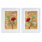 pair of framed chinoiserie wall art prints featuring vintage-style butterfly and flower branch on gold leaf background