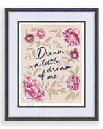 framed pink vintage-style chinoiserie wall art print featuring flowers and leaves with the quote 'dream a little dream of me'
