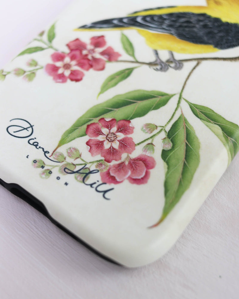 close up of Luxury phone case featuring vintage style botanical bird on tree branch with flowers