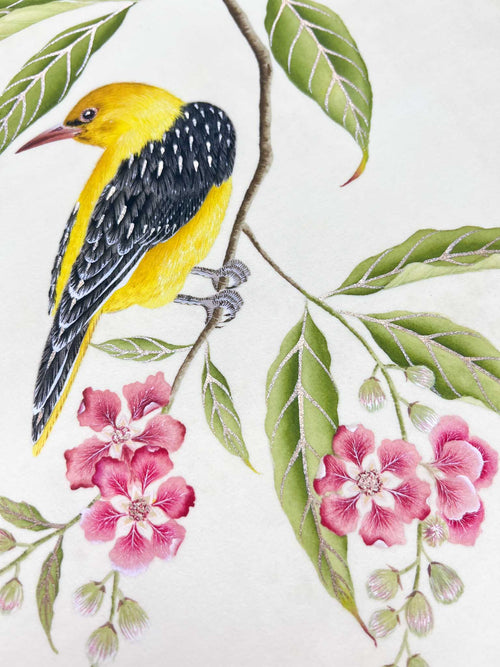 close up of botanical wall art print featuring gold sparkle embellished exotic bird on tree branch with flowers