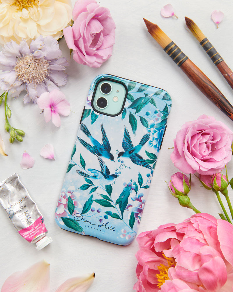 blue luxury chinoiserie phone case featuring three vintage inspired birds surrounded by leaves and flowers