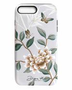 Luxury phone case featuring vintage style butterflies and flower branches with a bamboo background