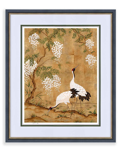 framed Japanese style chinoiserie wall art print featuring cranes and wisteria tree on gold background