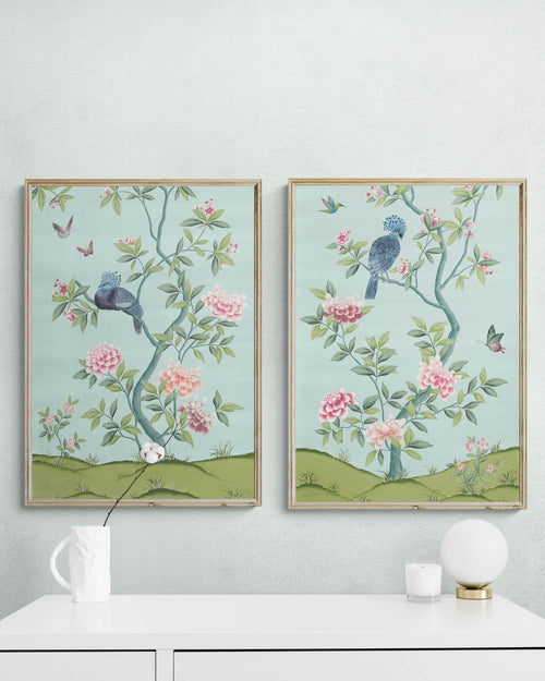 pair of 2 framed blue and green botanical chinoiserie wall art prints with flowers and birds in Chinese painting style on wall