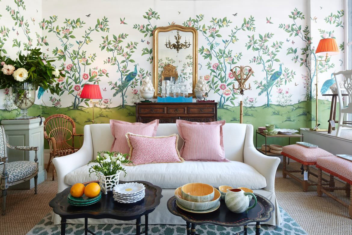 Grandmillennial style living room with vintage furniture and flowers by Brownlow Interiors featuring Diane Hill's 'Florence' chinoiserie wallpaper