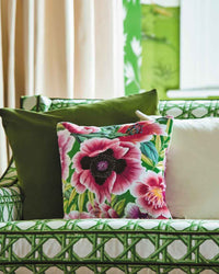 green and pink floral chinoiserie fabric on cushion