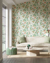 botanical wallpaper featuring chinoiserie style birds, branches, and butterflies in modern grandmillennial style living room