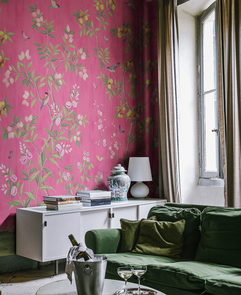 'Chinoiserie Chic, Fuschia' chinoiserie wallpaper by Diane Hill for Rebel Walls in a living room lifestyle photo