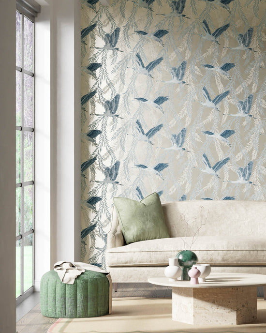 blue tonal botanical wallpaper featuring chinoiserie style birds in modern living room