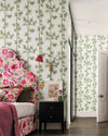 white and green botanical wallpaper featuring chinoiserie style bamboo in maximalist bedroom