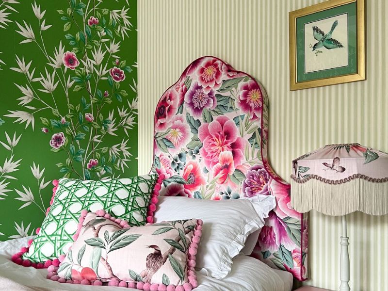 Green maximalist bedroom featuring chinoiserie fabrics and wallpapers from the collection of Diane Hill x Harlequin