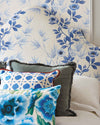 classic blue and white chinoiserie fabric featuring bamboo and flowers on upholstery in regencycore bedroom