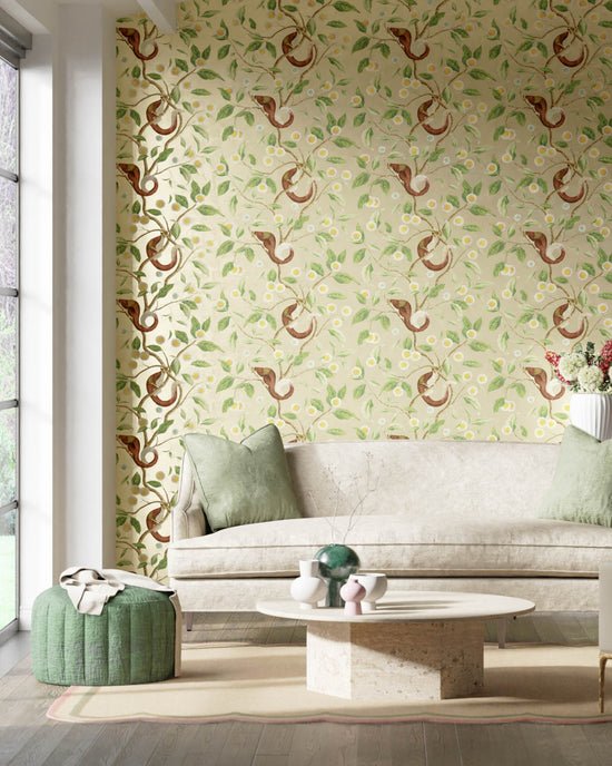 green botanical wallpaper featuring chinoiserie style animals and fruit in modern living room