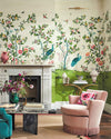 classic chinoiserie wallpaper featuring chinese illustration style peacocks, birds, and botanicals in grandmillennial style living room