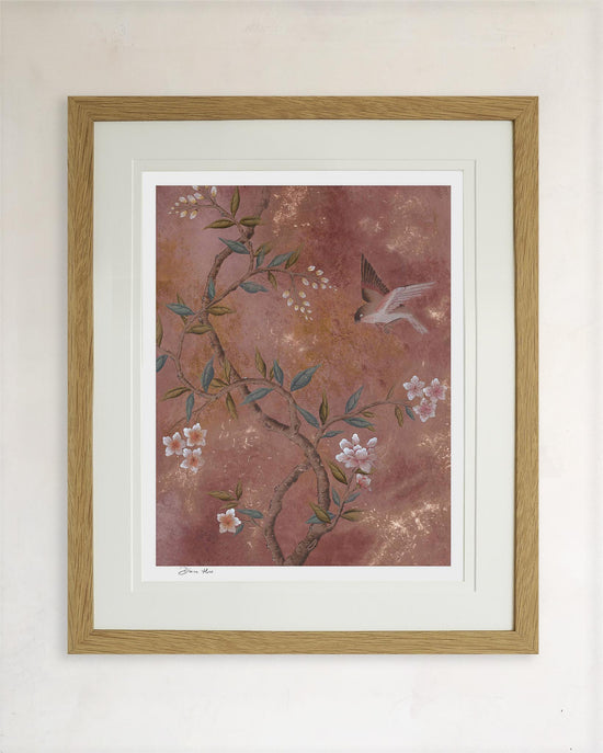 framed chinoiserie wall art print featuring vintage inspired bird branches and flowers on a distressed mottled background