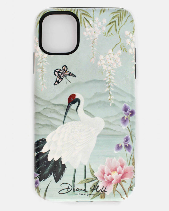 luxury chinoiserie phone case featuring Japanese inspired crane, flowers, and wisteria on a blue mountain background