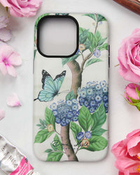 white luxury chinoiserie phone case featuring blue vintage inspired butterfly and flowers