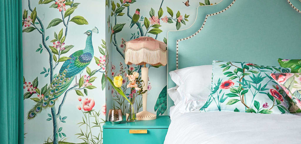 Diane Hill's teal blue chinoiserie bedroom featuring her 'Florence' chinoiserie wallpaper and chinoiserie fabrics from her harlequin collection on the soft furnishings