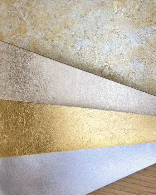 metallic painting papers for artists in mottled gold and silver, champagne, gold, and silver leaf.