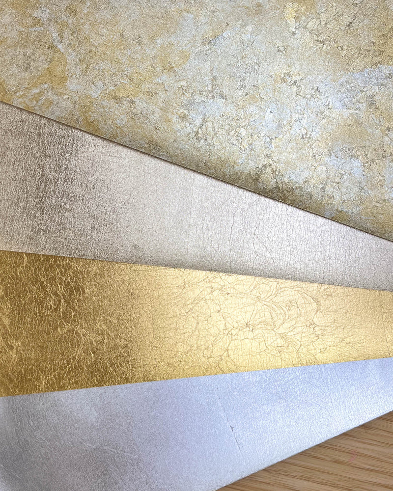 metallic painting papers for artists in mottled gold and silver, champagne, gold, and silver leaf.