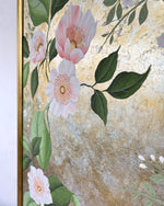 Close up of Diane Hill's original chinoiserie painting 'Mottled Lush Blooms And Butterflies (A)' in a gold frame on a plain white wall