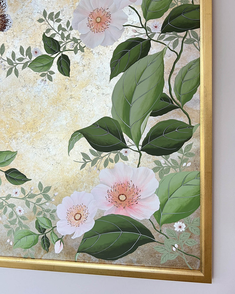 Close up corner Diane Hill's original chinoiserie painting 'Mottled Lush Blooms And Butterflies (B)' in a gold frame on a plain white wall