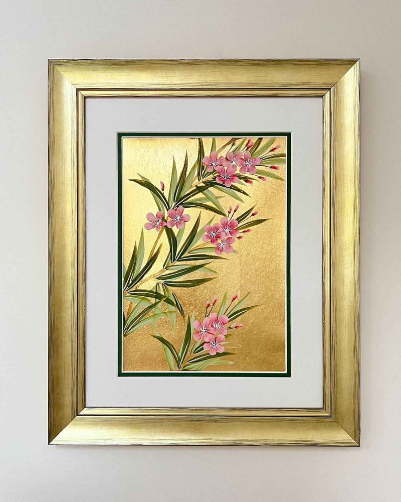 Diane Hill's original chinoiserie painting 'Gold And Pink Blooming Oleander (A)' in a gold frame on a plain white background