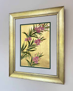 Diane Hill's original chinoiserie painting 'Gold And Pink Blooming Oleander (A)' in a gold frame on a plain white background
