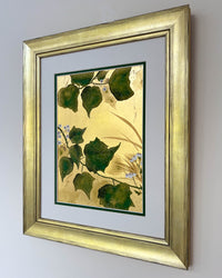 framed botanical chinoiserie painting on gold leaf paper featuring green vines with white flowers