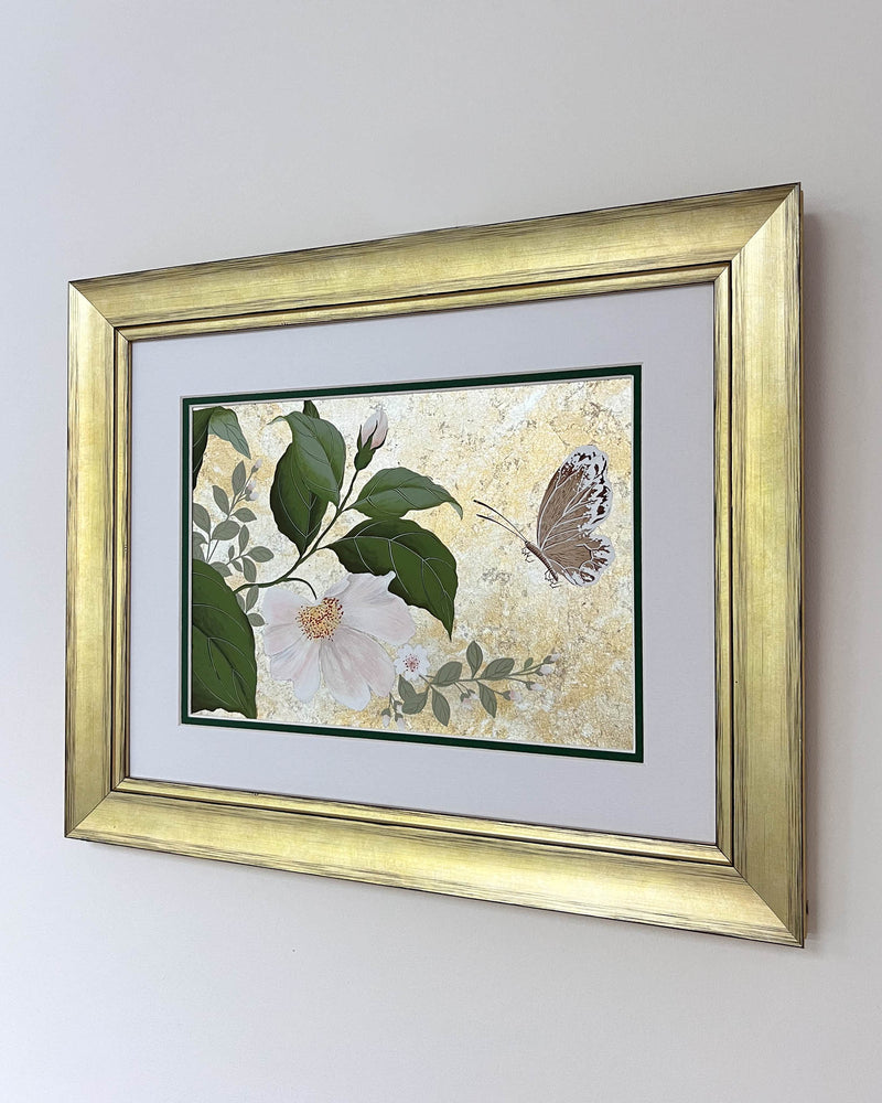 Diane Hill's original chinoiserie painting 'Mottled Dog Rose And Butterfly' in a gold frame on a plain white background