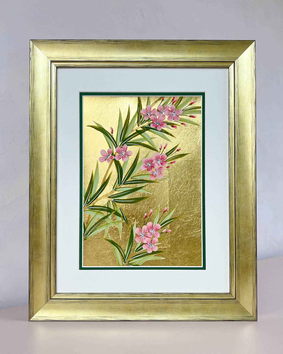 Diane Hill's original chinoiserie painting 'Gold And Pink Blooming Oleander (A)' in a gold frame on a plain white background