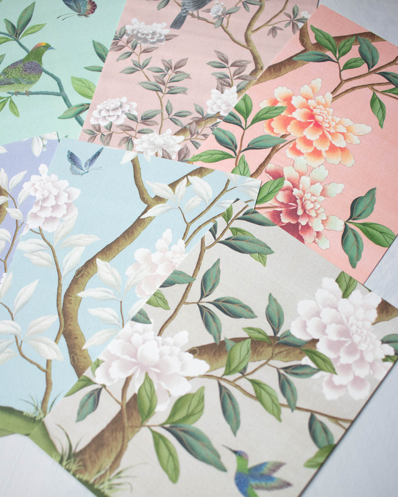 close up of 6 chinoiserie mini wall art prints in multi colours featuring botanical illustrations of birds, flowers, butterflies, and trees