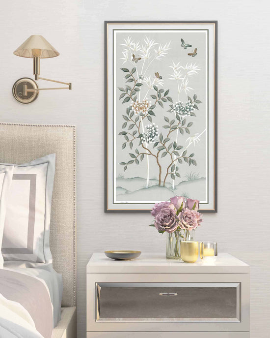 pebble blue framed chinoiserie wall art print featuring butterflies, flower branches, and bamboo hung on wall