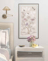 soft pink framed chinoiserie wall art print featuring butterflies, flower branches, and bamboo bedroom and bedside table with flowers