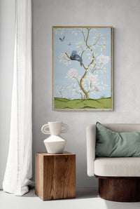 Blue botanical chinoiserie wall art print with flowers and birds in Chinese painting style on wall