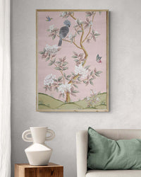 Pink botanical chinoiserie wall art print with flowers and birds in Chinese painting style on wall