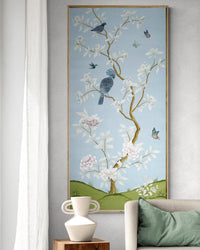 Blue botanical chinoiserie wall panel print with flowers and birds in Chinese painting style on wall