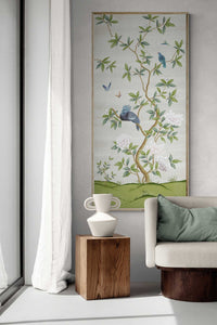 framed ivory and green botanical chinoiserie wall panel print with flowers and birds in Chinese painting style on wall