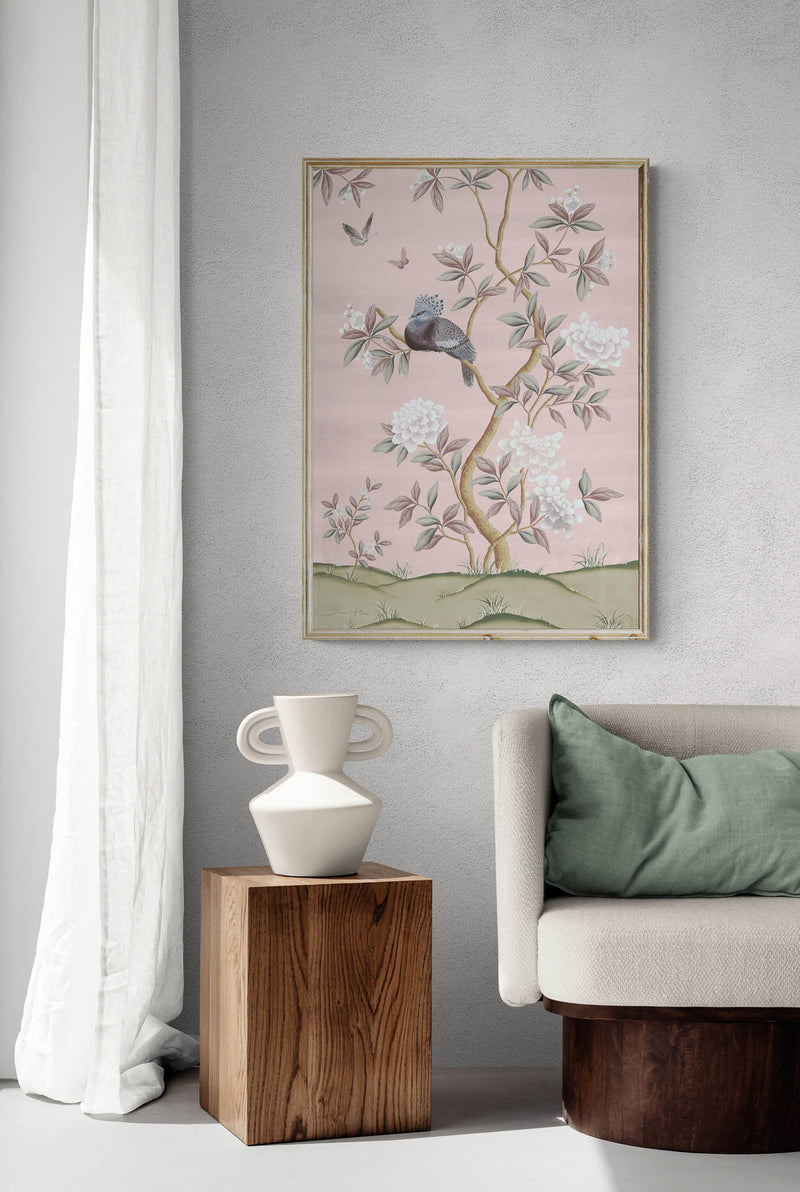 Pink botanical chinoiserie wall art print with flowers and birds in Chinese painting style on wall